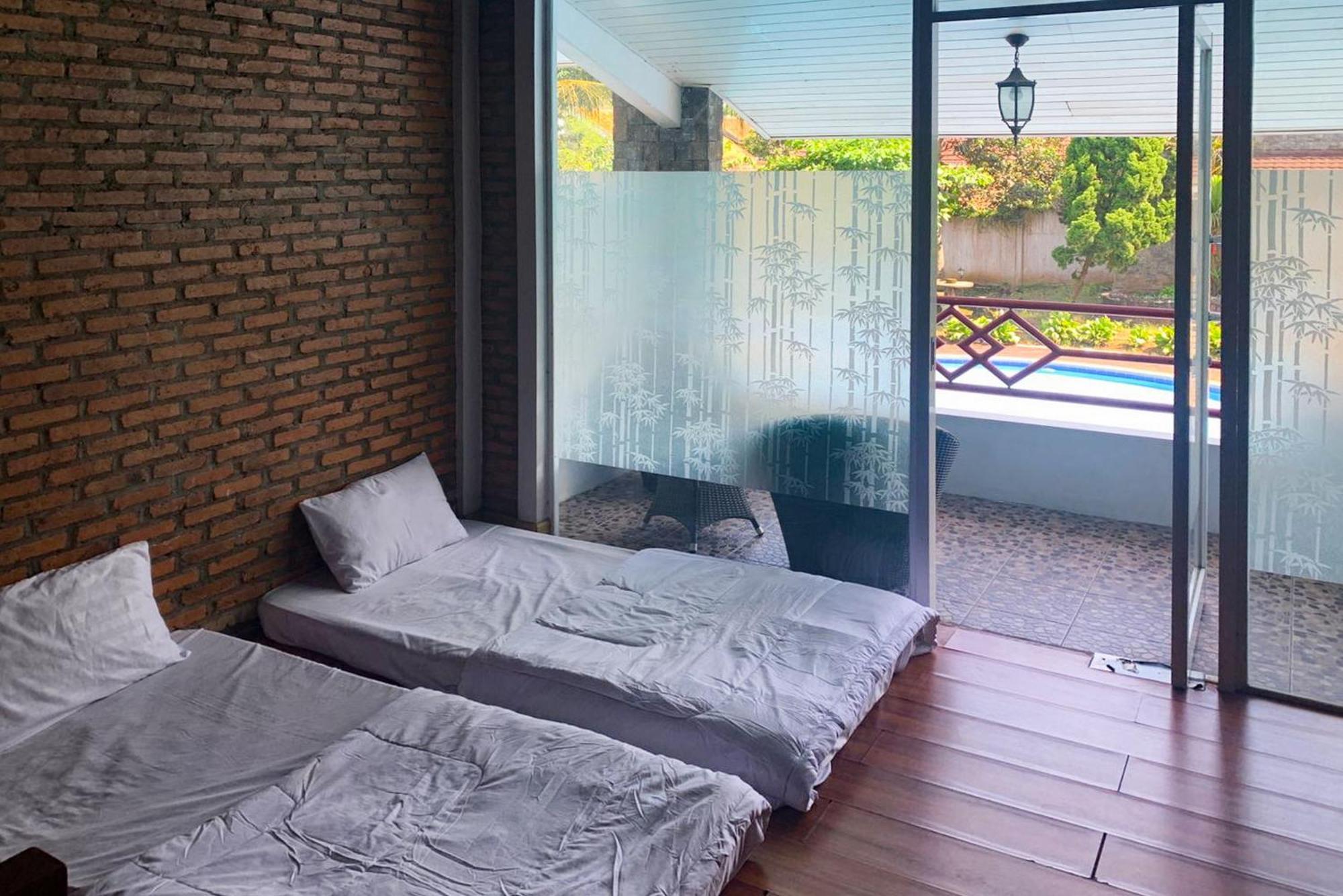 Urbanview Hotel Villa Q Gisting Bandjarnegeri ภายนอก รูปภาพ